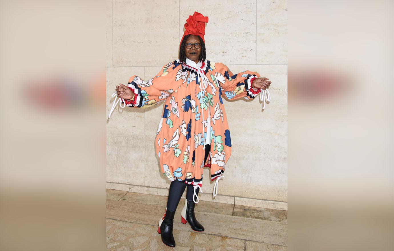 whoopi goldberg crazy outfit red hat new york