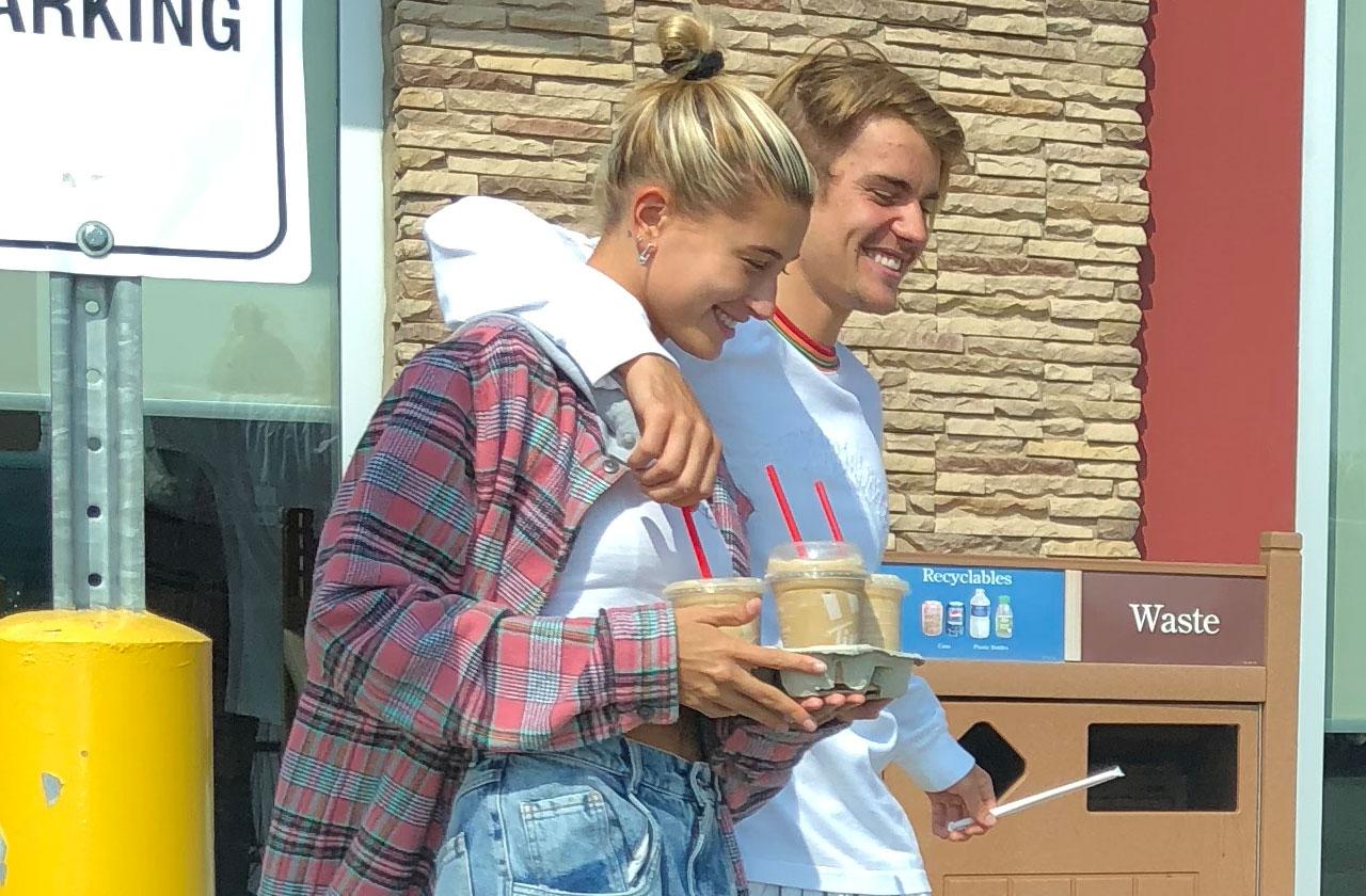 hailey baldwin and justin bieber are all smiles while justin shows