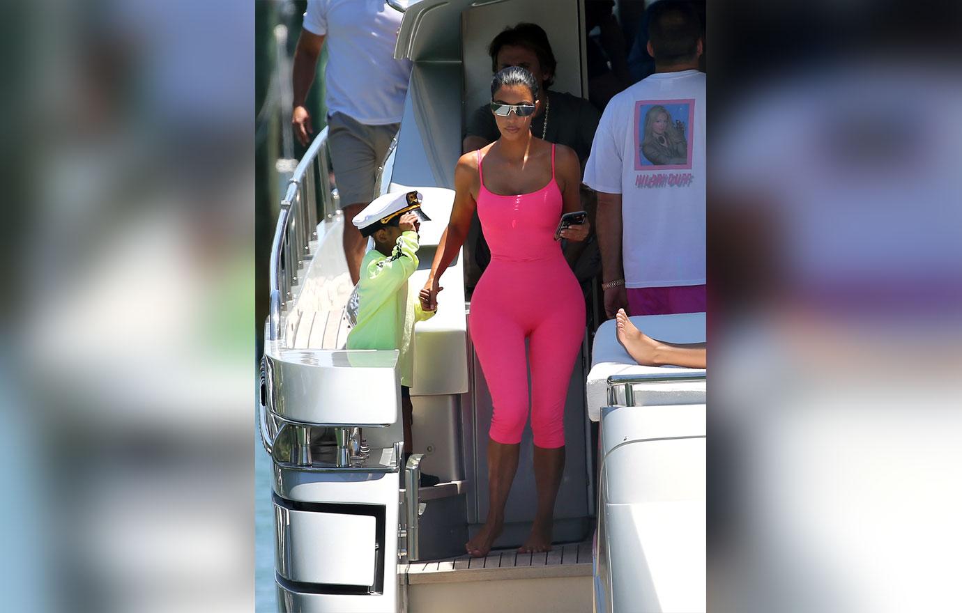 Kim Kardashian Shows Off Curves In Pink Bodysuit