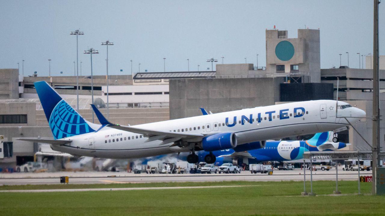 Dante Raymond Milne was arrested after allegedly texting a fellow passenger that he planned to hijack and crash the plane.