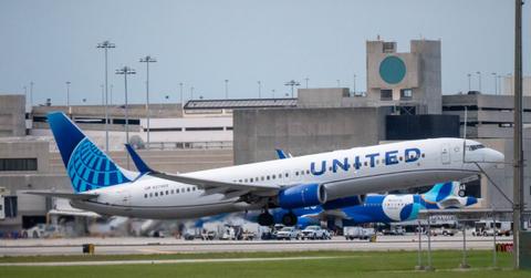 Dante Raymond Milne was arrested after allegedly texting a fellow passenger that he planned to hijack and crash the plane.
