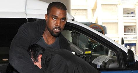 //kanye west photographer scuffle not guilty