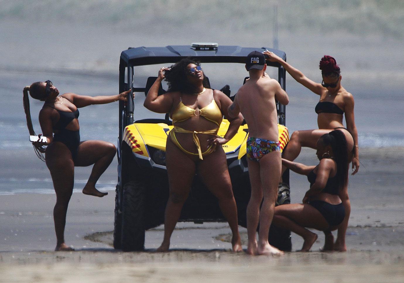 Lizzo Shows Off Curves In Gold Bikini During Beach Day: Photos