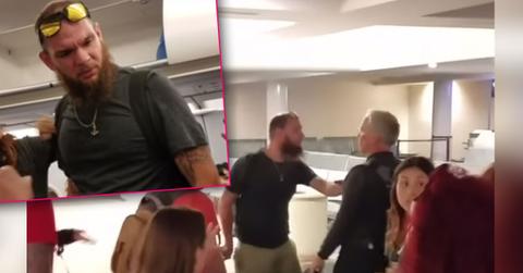 //man punches service dog face on plane PP