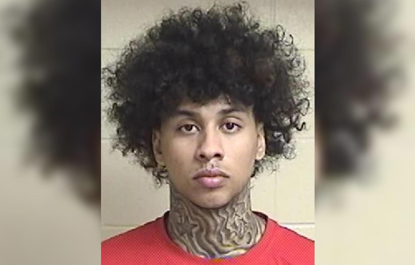 Viral Mug Shot Guy, Wide Neck, Back in Jail After Bond Revoked