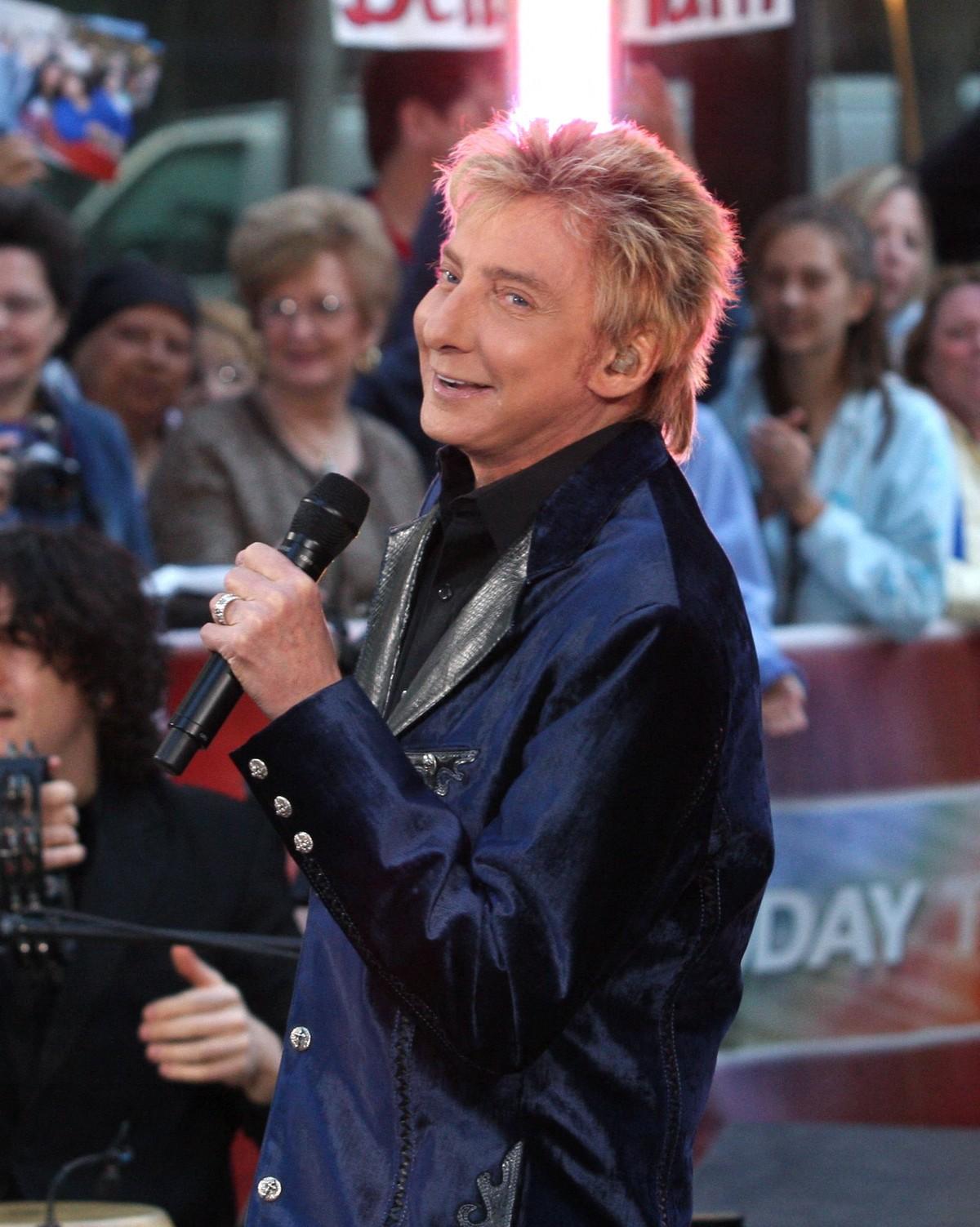 After a week in the ICU, Manilow admitted he is still learning how to breathe as recovery continues.
