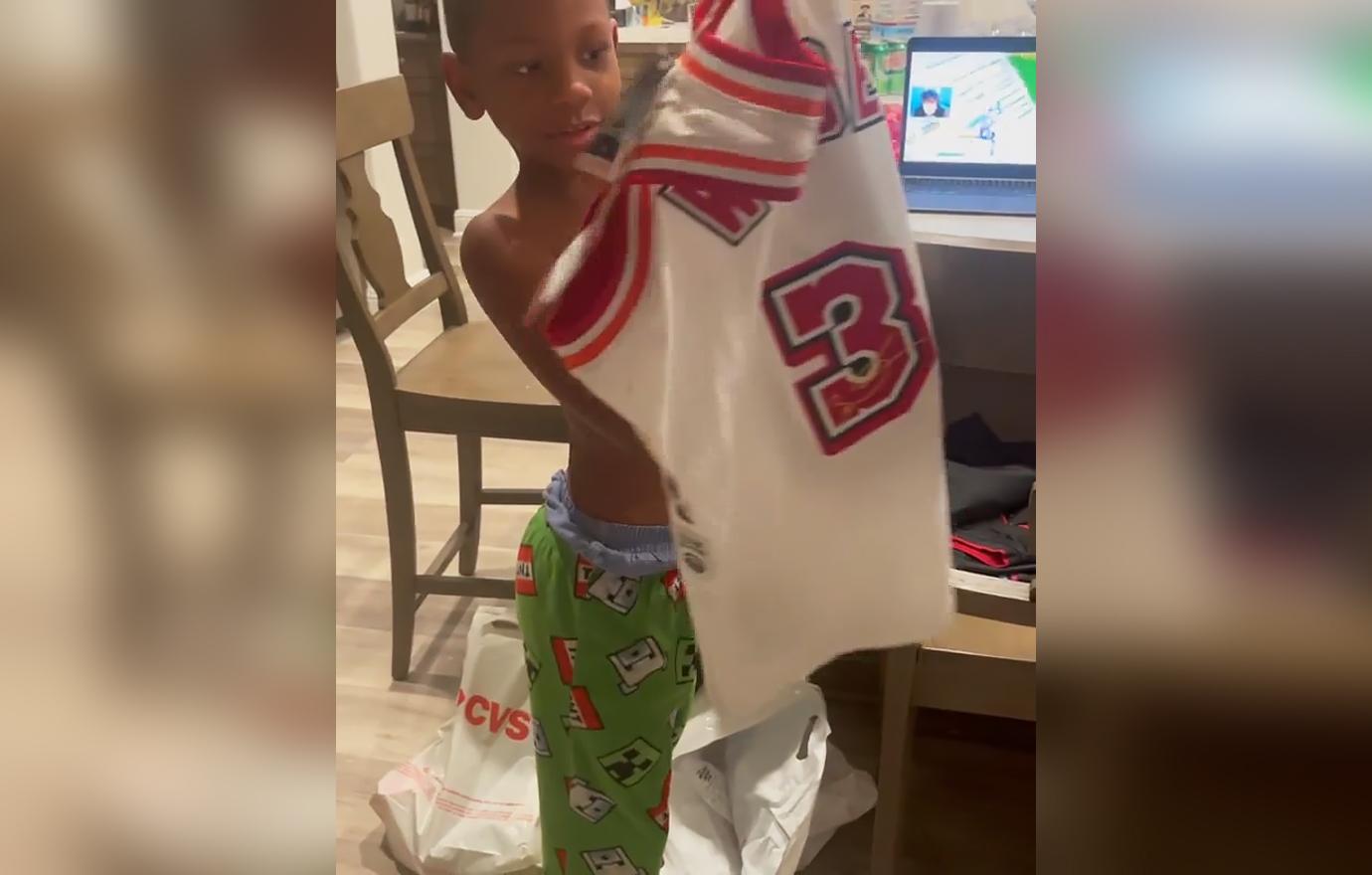 Dwyane Wade's Baby Mama Asks Their Son 'Do You Know Who That Is?' While He  Opens Wade Jersey