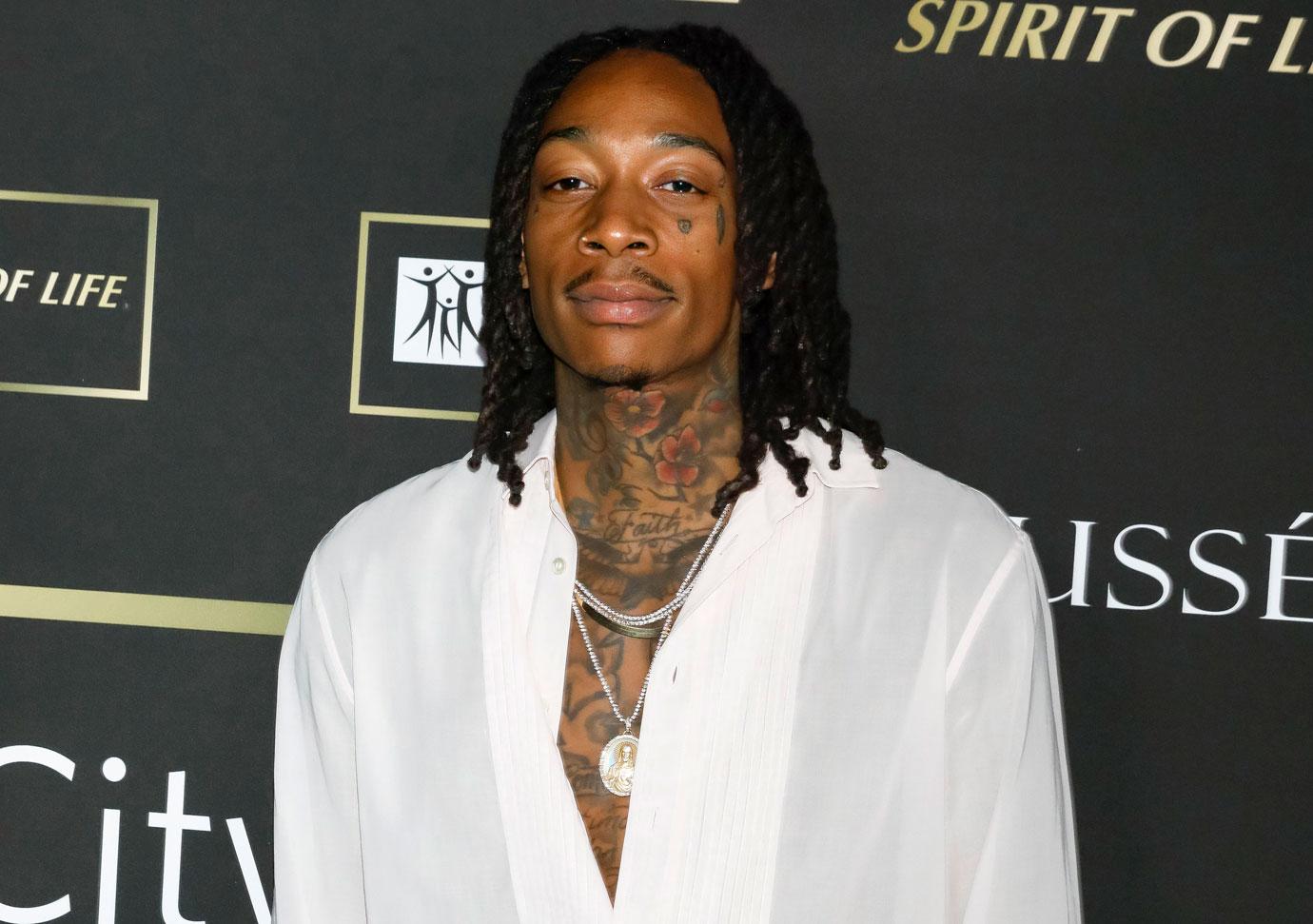 wiz khalifa sued ex assistant  screwed out overtime groceries