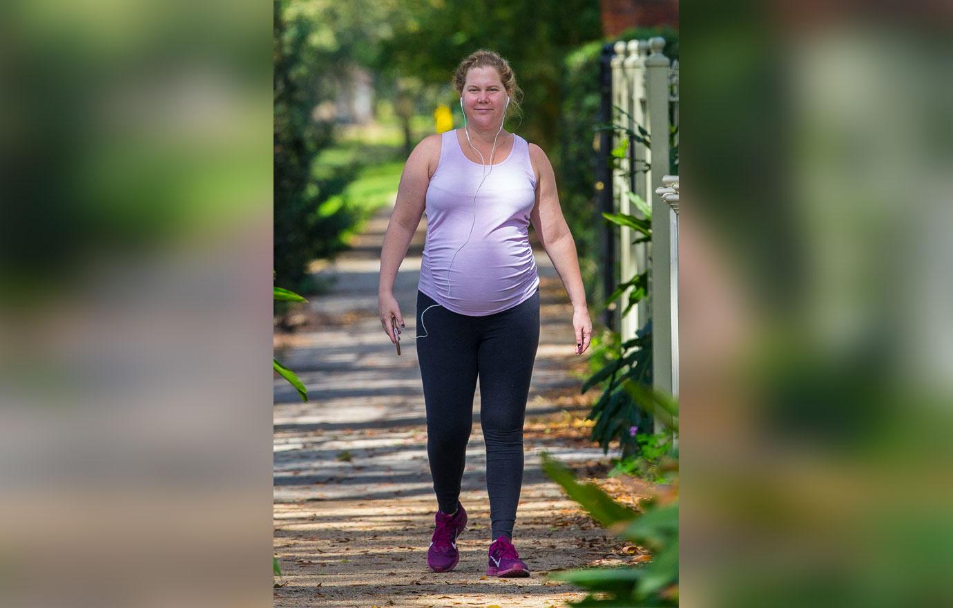 Pregnant Amy Schumer Shows Off Baby Bump During MakeupFree Stroll