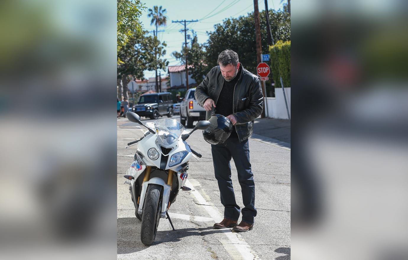 //ben affleck rides motorbike to church