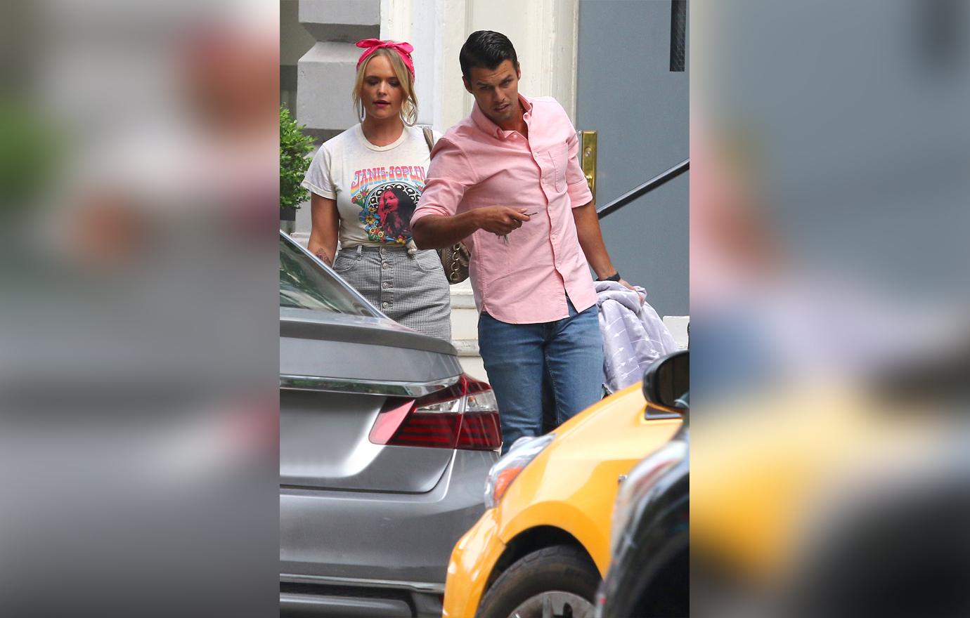 Miranda Lambert and Husband Brendan McLoughlin Seen Walking Holding Hands Outside In Matching Pink and Denim Outfits