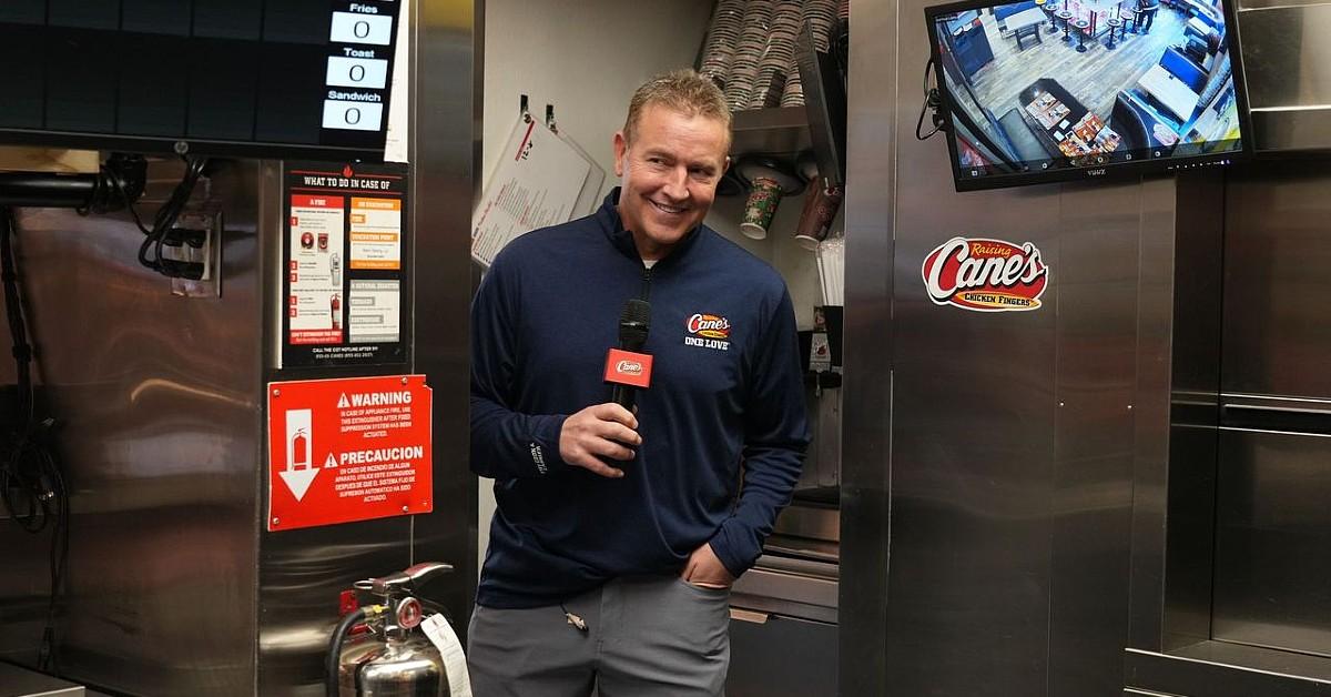 radaronline.com - Radar Staff - Kirk Herbstreit Trades the Broadcast Booth for a Fryer as He & His Dog Peter Take Over Raising Cane's Nashville Flagship Store