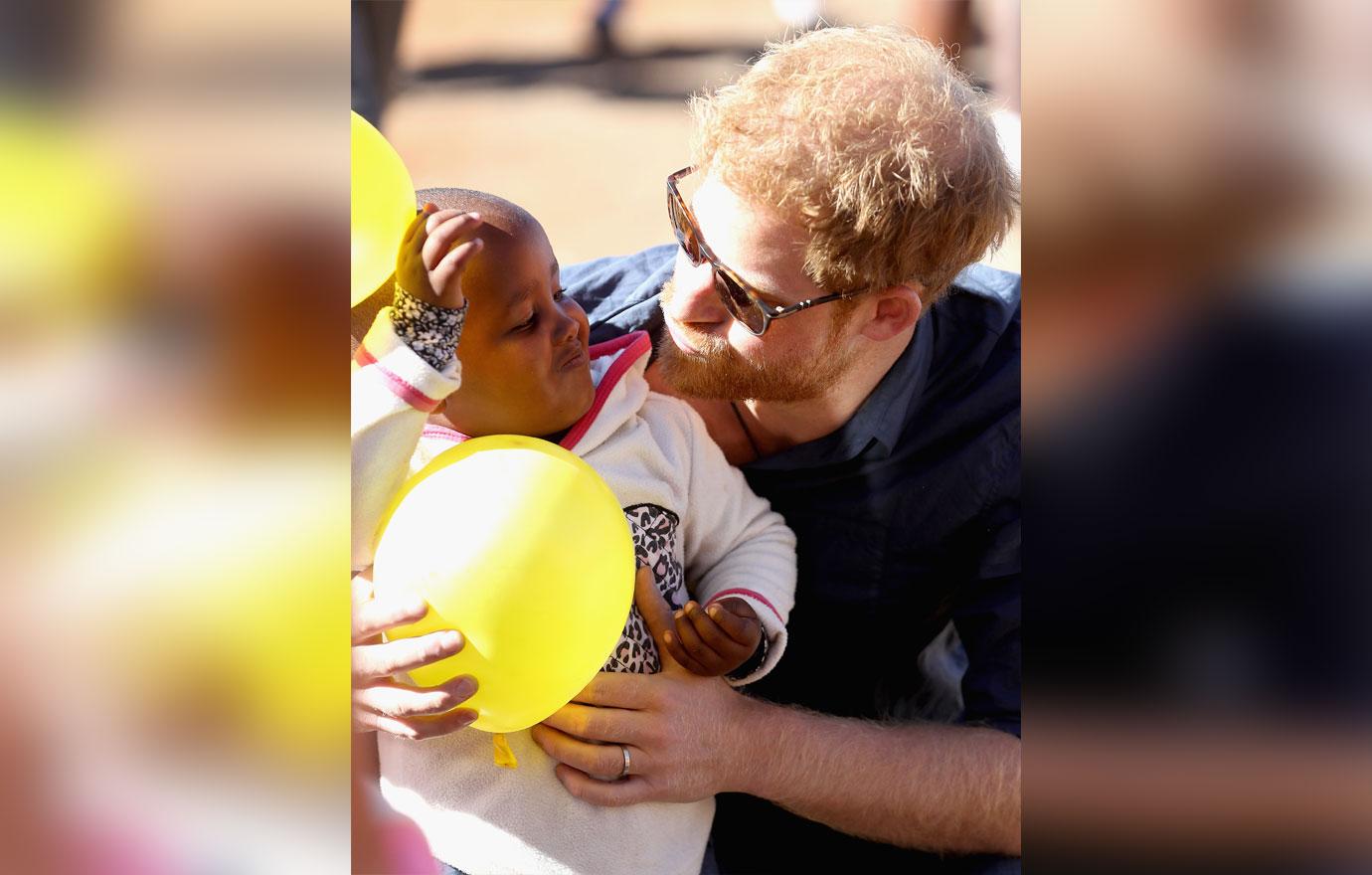 Prince Harry Plays With Children