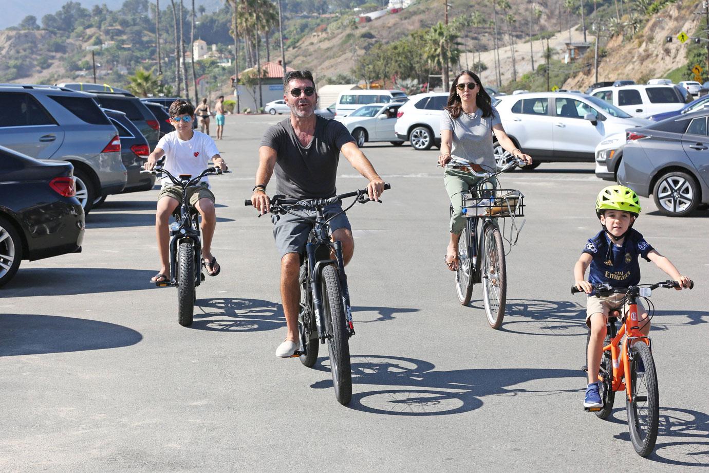 Simon Cowell Goes Bike Riding With His Family