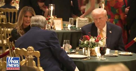 photo of donald trump, melania and viktor knavs