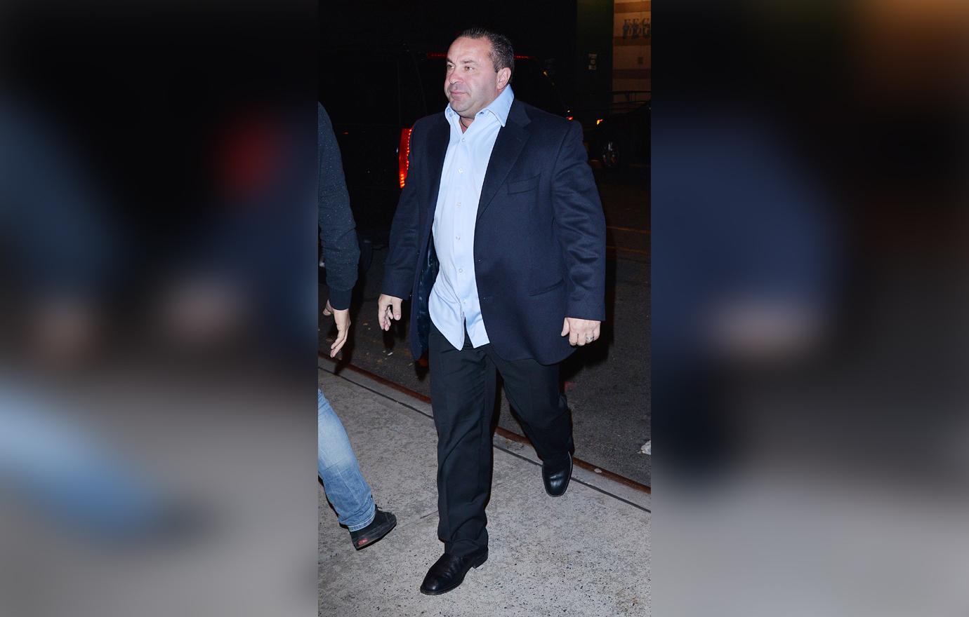 Joe Giudice Looks Serious Walking Outside at Night