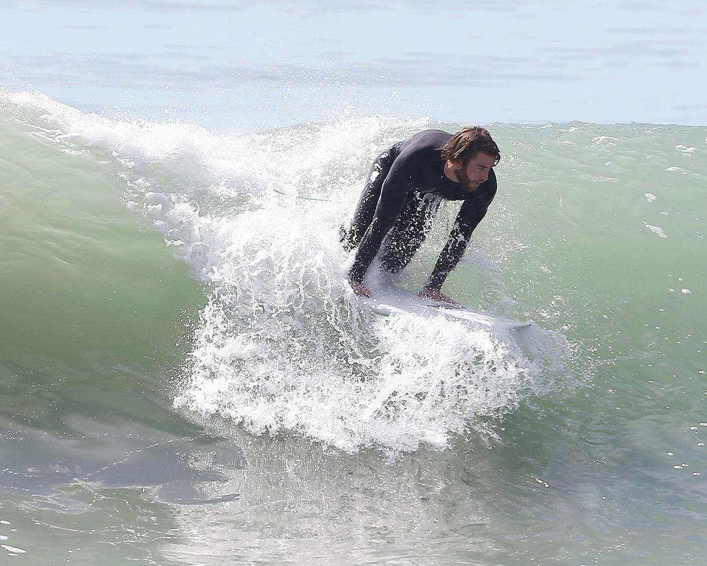 Liam Hemsworth Surfing Malibu Pics