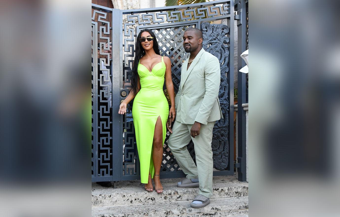 Kanye West Grabs Wife Kim Kardashian's Butt As She Rocks Curve-Hugging  Latex Dress