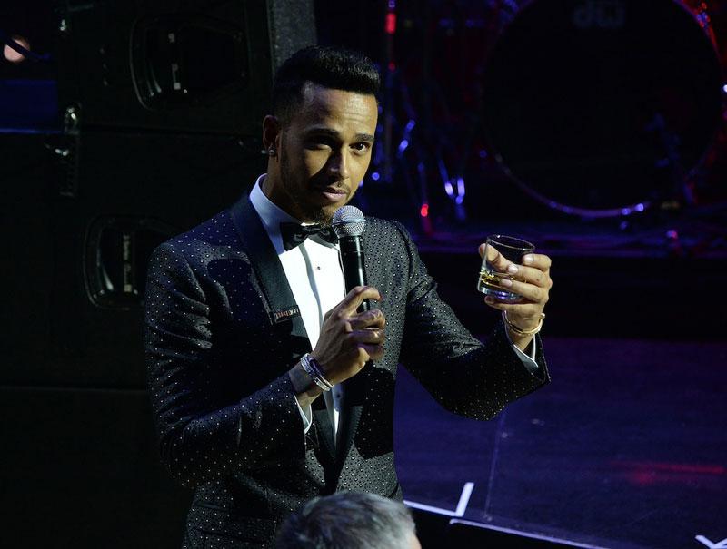 //Lewis Hamilton toasts with Johnnie Walker at the TIME  Gala