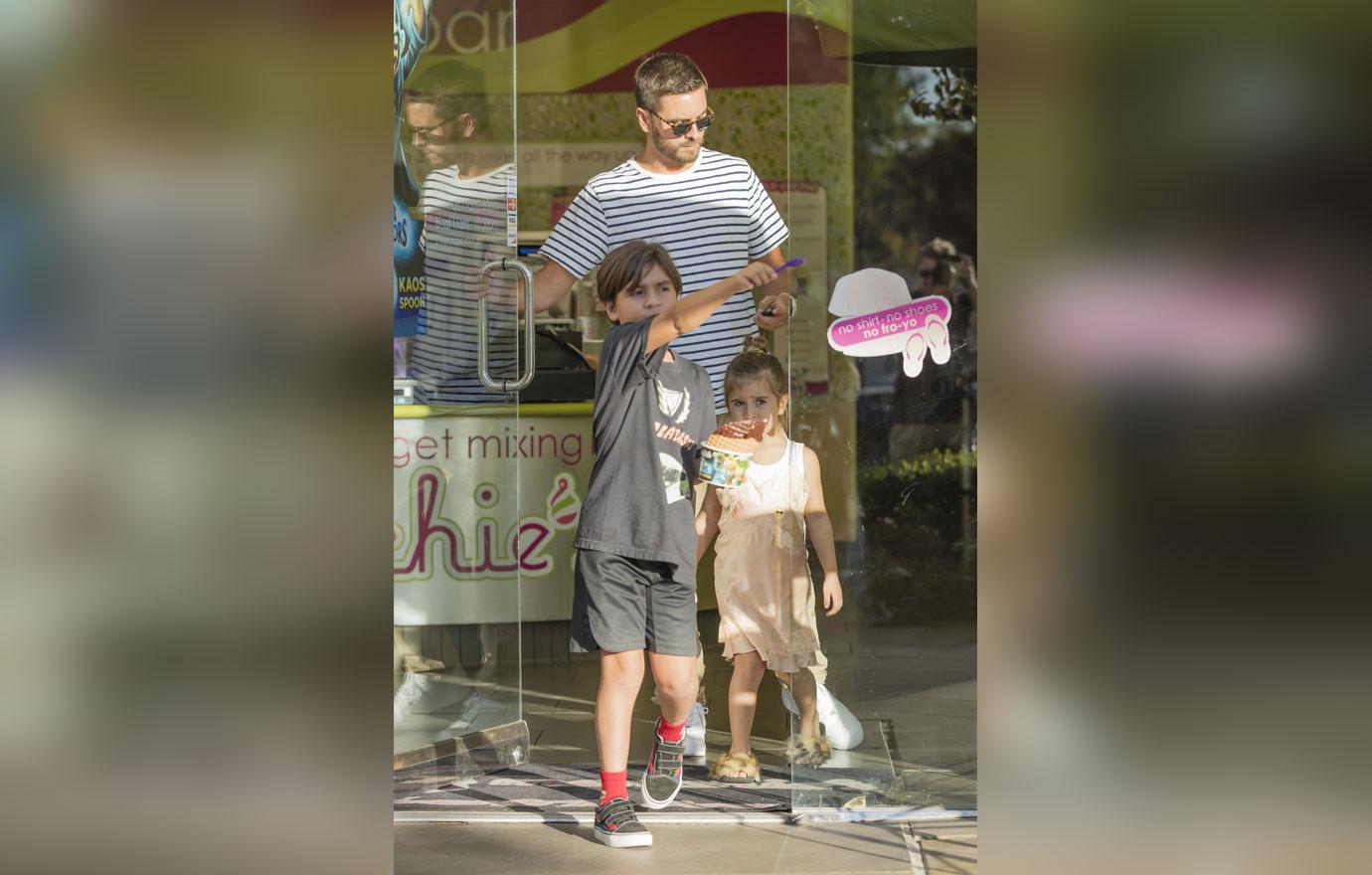 Scott Disick Watches Kids While Kourtney Kardashian Is In Paris