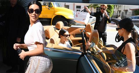 Kim and Kourtney Kardashian out in Miami in a green Rolls Royce with Jonathan Cheban