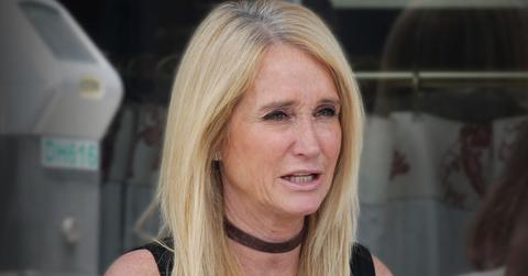Kim Richards Making scared face Wearing Black Tank Top And Leather Choker