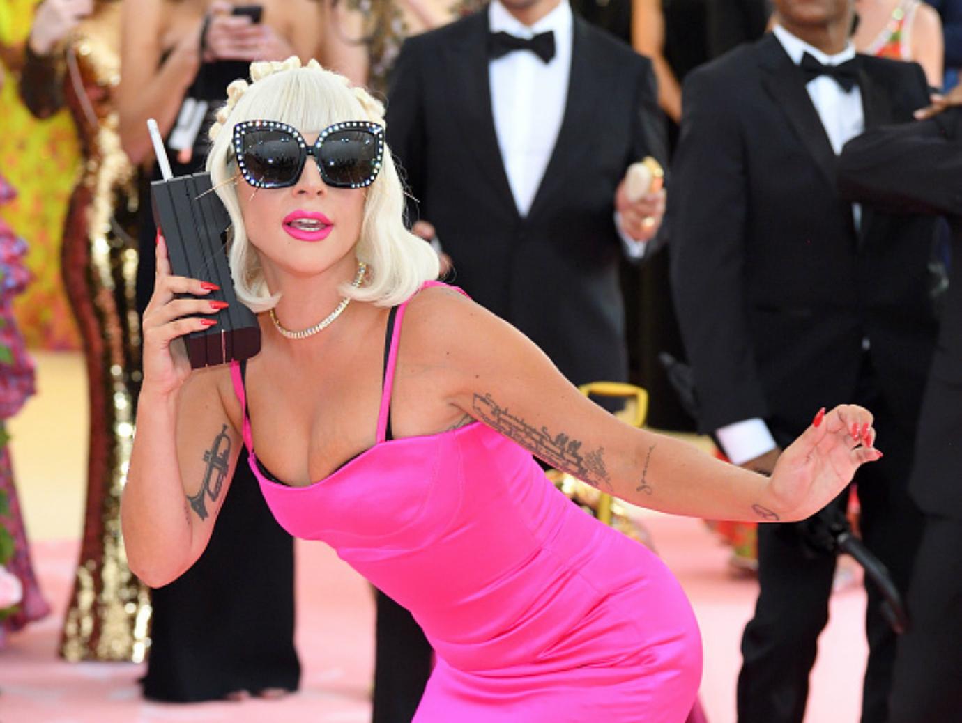 Lady Gagaga poses on the red carpet at the Met Gala.