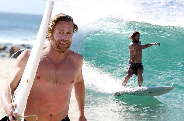 Shirtless Simon Baker Sports Scruffy Beard On Surfing Excursion