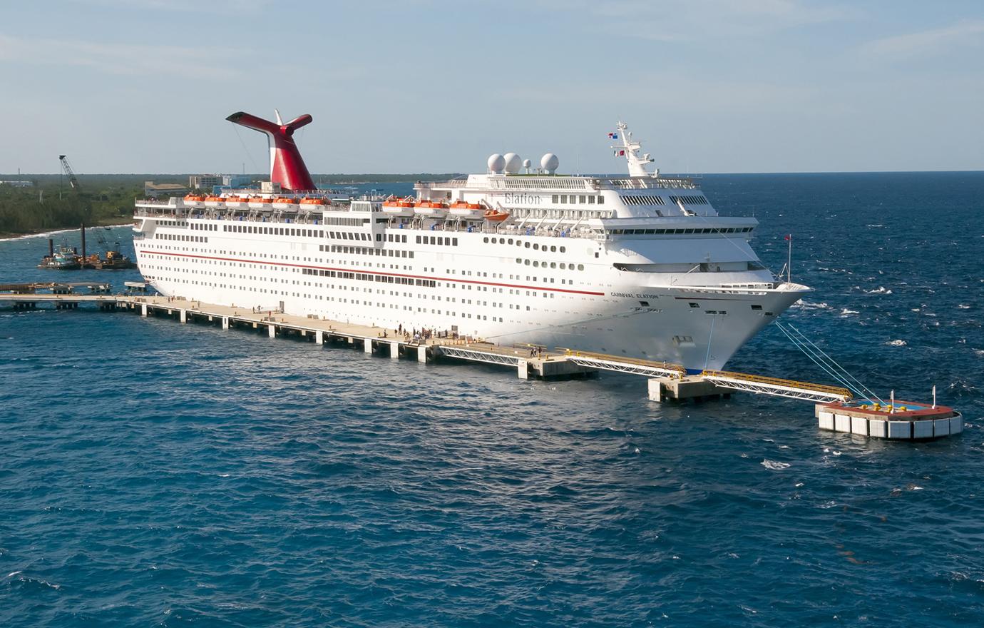 Carnival Elation Cruise ship docked in Freeport Grand Bahamas at sunset