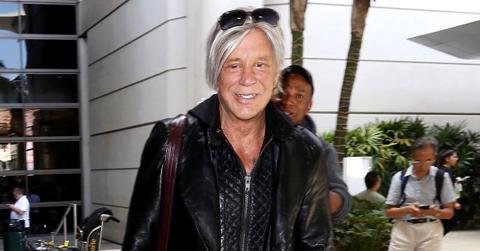 Mickey Rourke has been removed from his home after a defiant standoff with mounting issues.