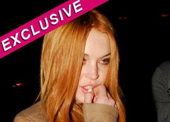 //lindsay lohan surveillance video splash