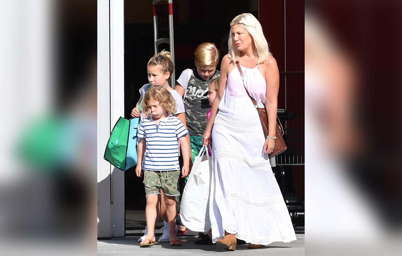 Tori spelling shops target money problems