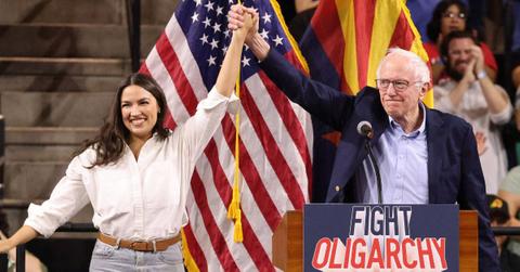 Photo of Alexandria Ocasio-Cortez and Bernie Sanders