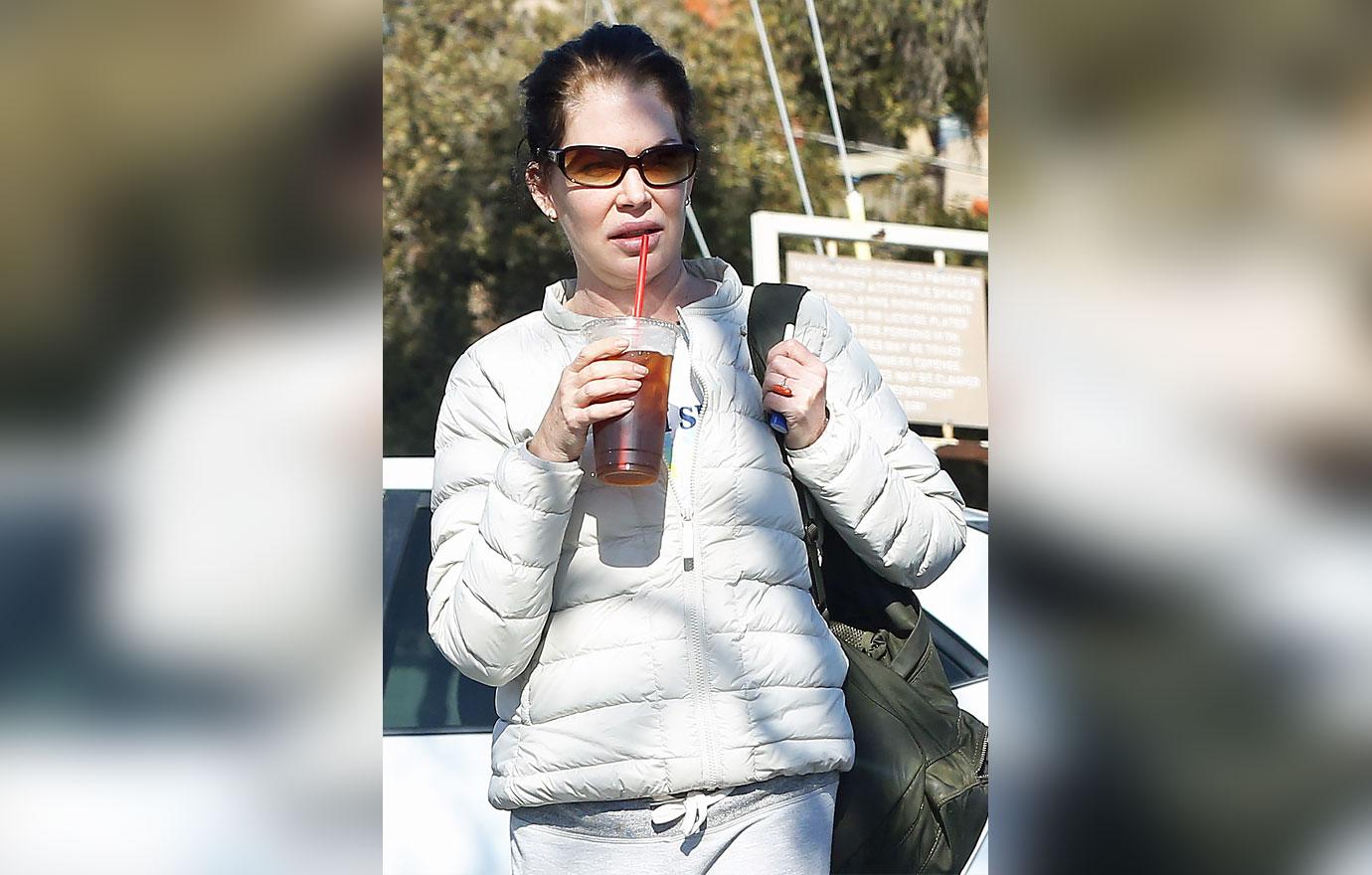 Lara Flynn Boyle Looks Unrecognizable In Rare Outing Spotted Smoking Cigs With Female Friend