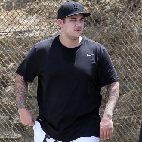 //rob kardashian feeding sadness with food