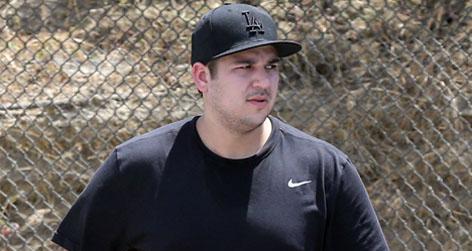 //rob kardashian feeding sadness with food