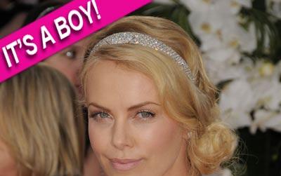 //charlize theron adopts baby inf