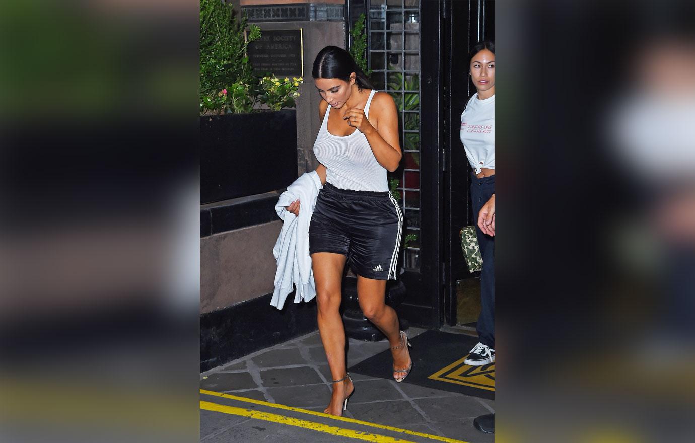 Kim Kardashian's Glammed-Up Workout Wear! Star Goes Braless in Tank Top,  Pairs Gym Shorts With Heels