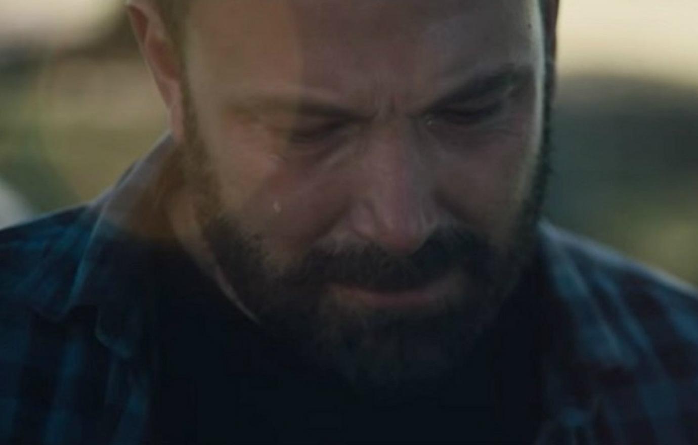 Ben Affleck, who wore a green and black plaid flannel, got emotional in a scene from the movie The Way Back.