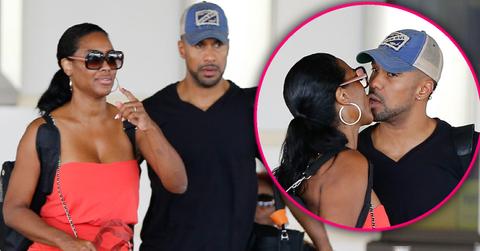 Kenya Moore Kisses Husband Amid Fertility Treatments