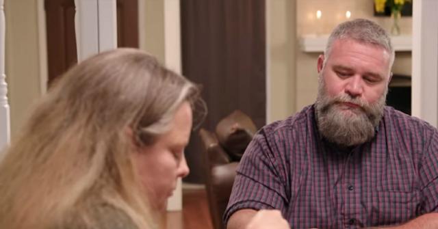 Bernie and Paige McGee talk at the dinner table.