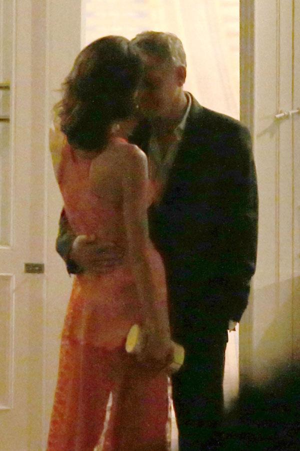 //george clooney amal clooney dinner italy kiss hold hands