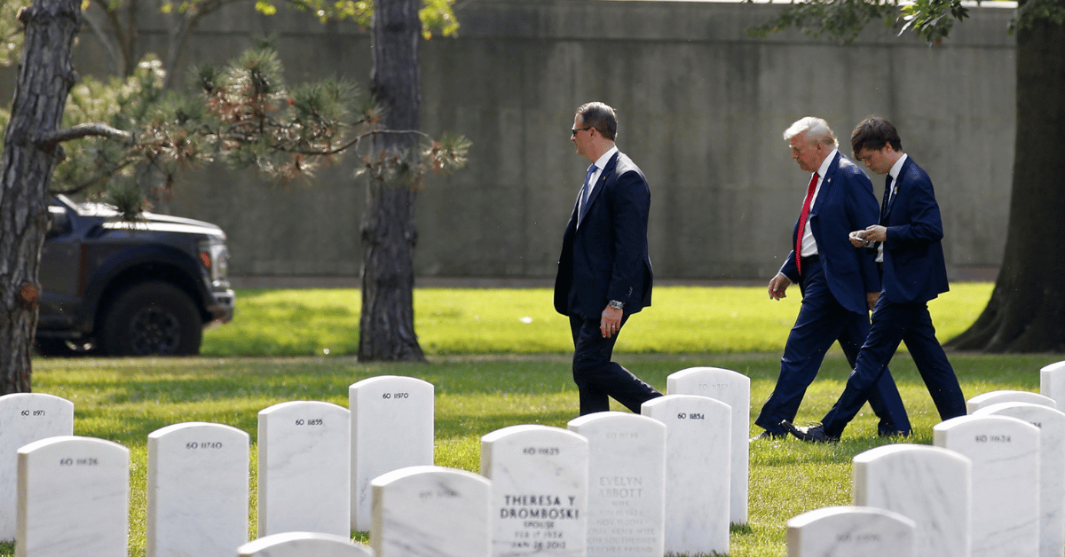 trump sparks outrage after arlington national cemetery photo op