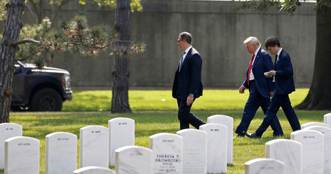 trump sparks outrage after arlington national cemetery photo op