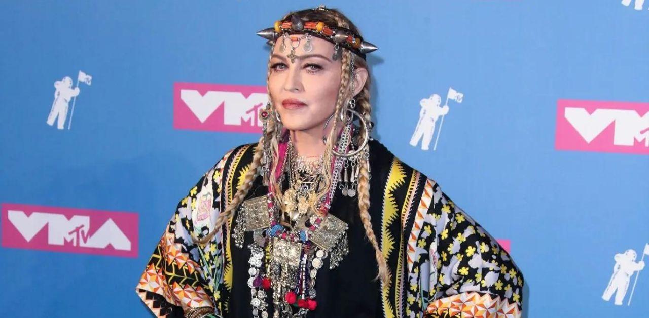 madonna removes luther vandross photo from aids tribute