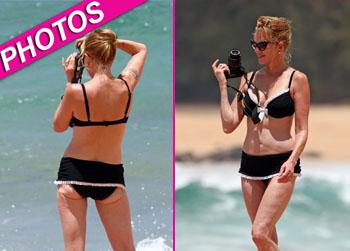 //melanie griffith bikini splash