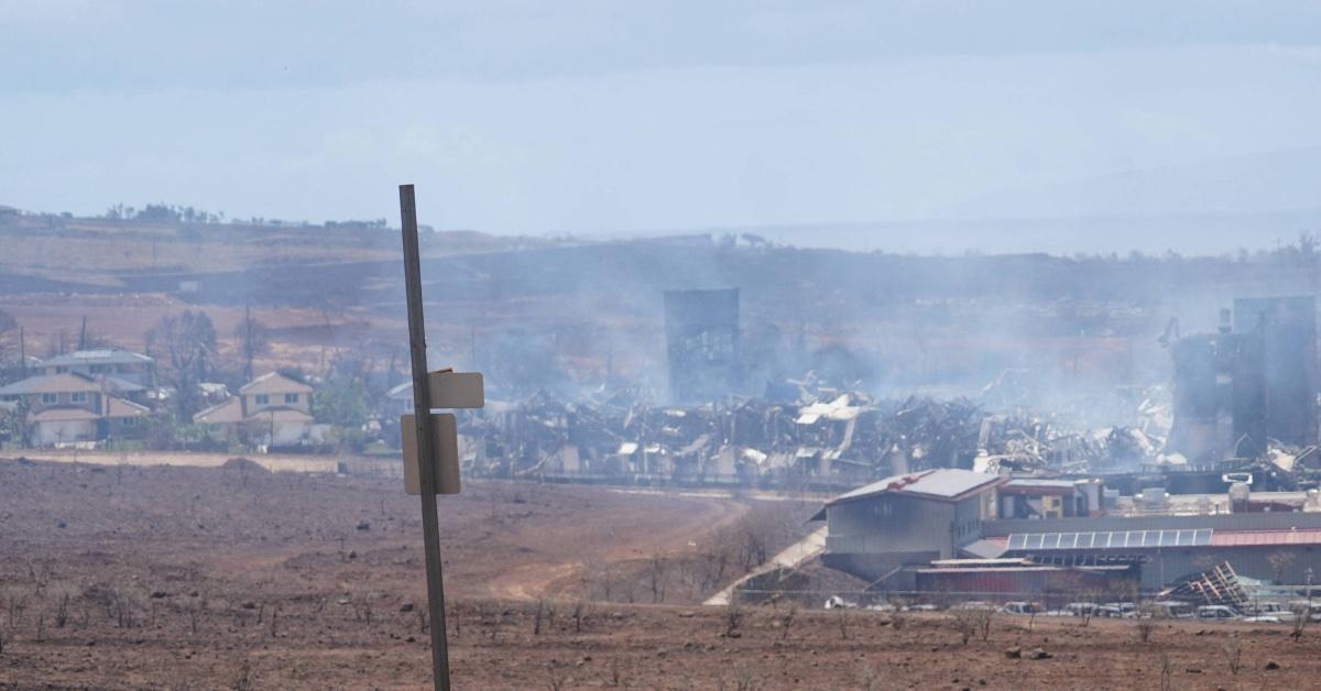 maui wildfires death toll bodies families huddled together