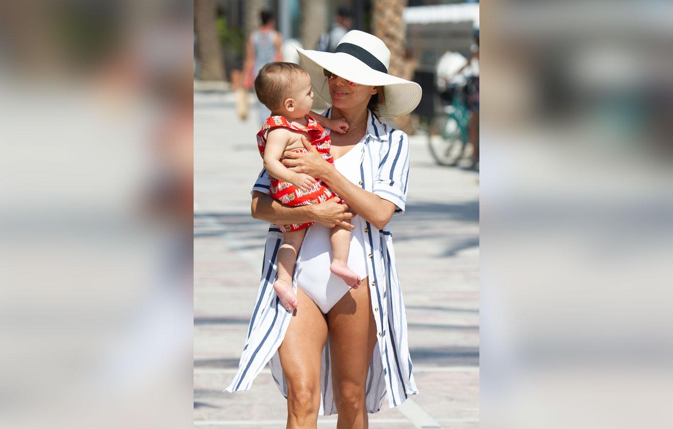 Eva Longoria Wears White Swimsuit On Beach With Baby Son