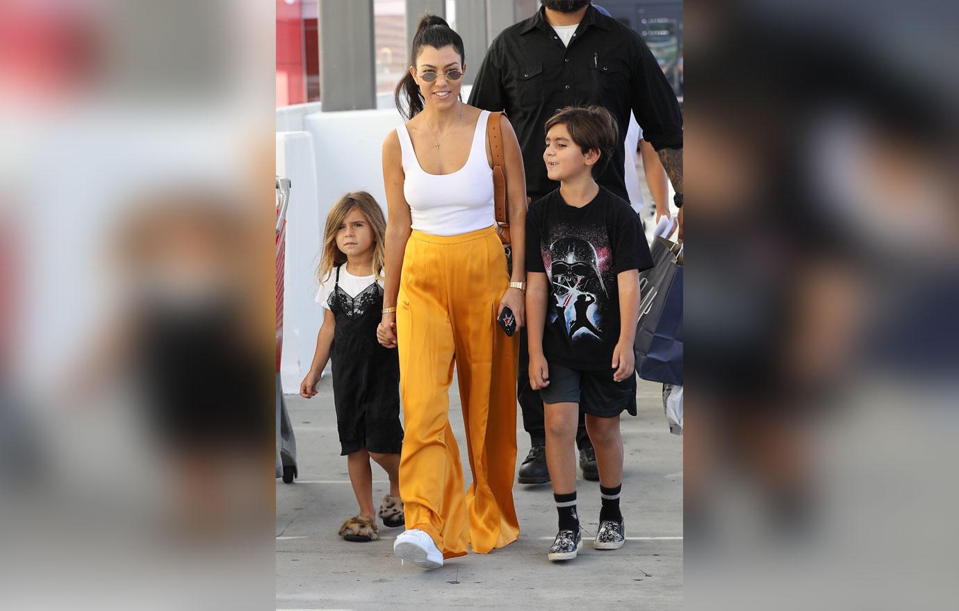 Kourtney Kardashian Goes Braless Yellow Pants