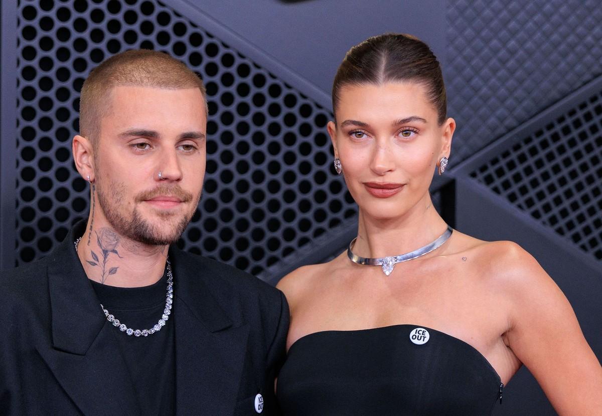 Justin Bieber reportedly stays close to Hailey Bieber during her makeup sessions, sometimes sitting on her lap while she gets ready.
